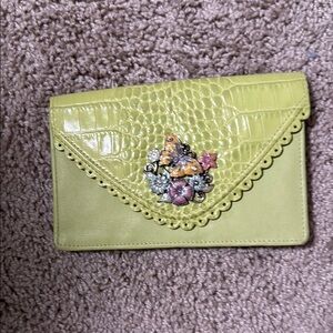 Elegant Brighton Green Clutch with Floral Accent